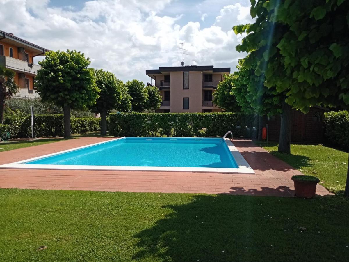 Casa Lugana 9 - Monolocale Con Piscina Fronte Lago Sirmione Dış mekan fotoğraf